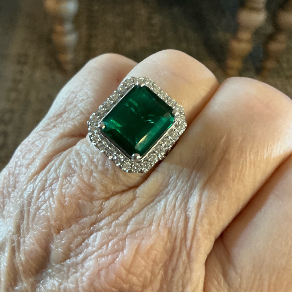 Radiant Silver Ring with Emerald Green Stone